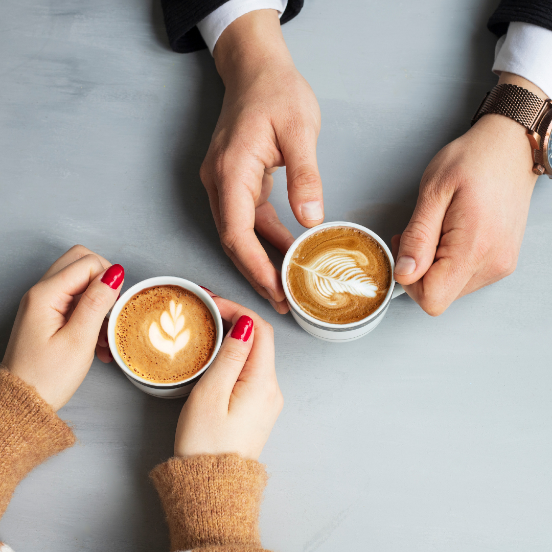 Two people sitting together over coffee – representing the supportive and approachable divorce services offered by Martin Shepherd Solicitors in Potters Bar, North Finchley, and Hertford